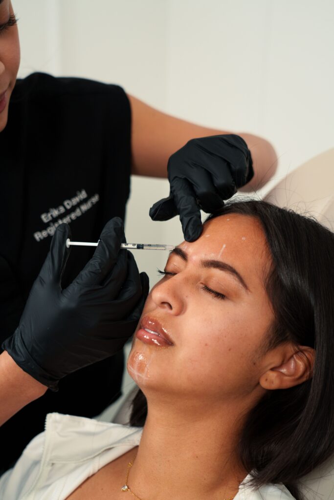 Doctor showing the typical botox cost and unit and cost by treatment area to a patient in Melbourne